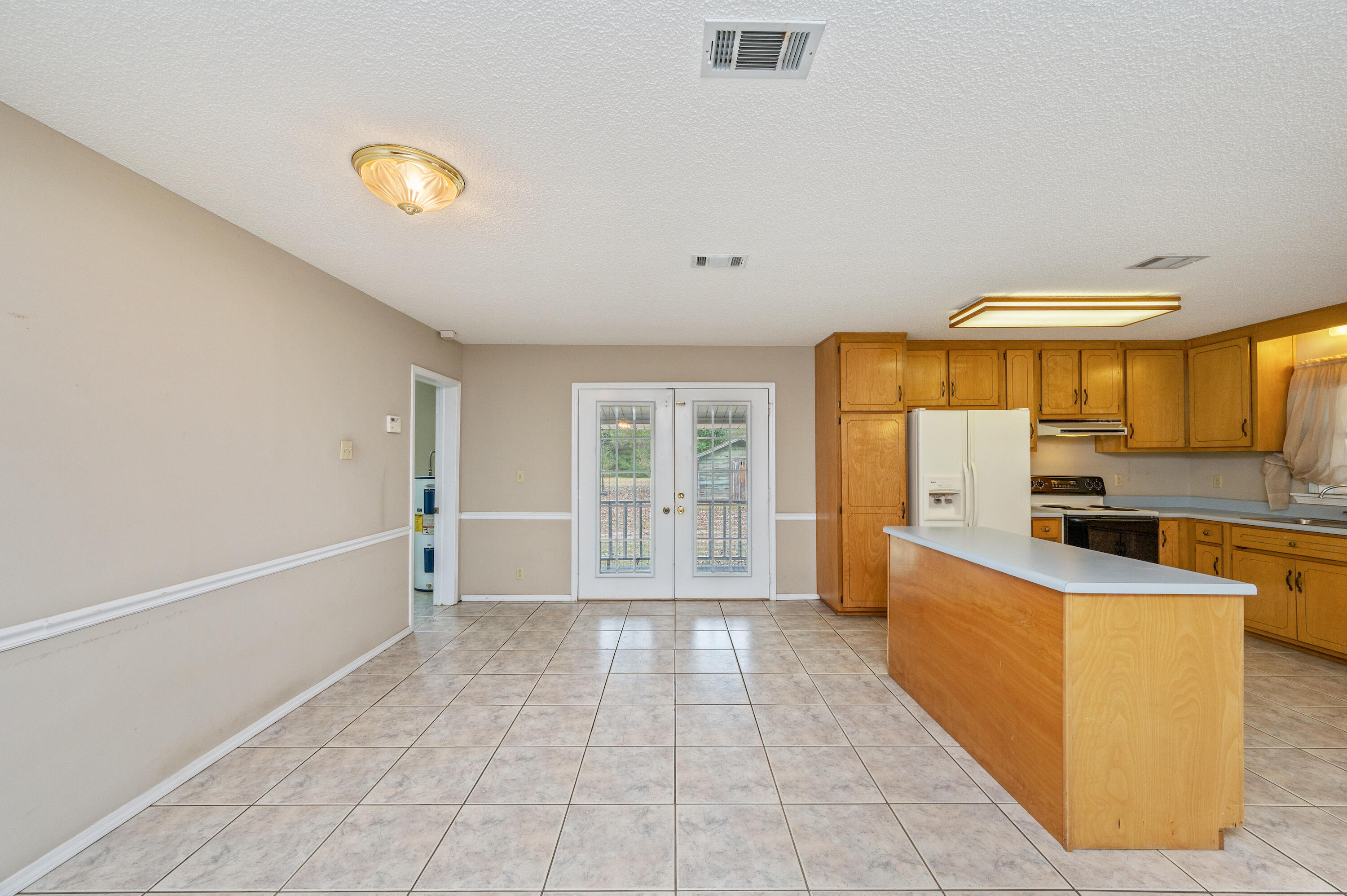 6433 Old River Road Baker, FL 32531 - Photo 13 of 27 a view of a kitchen with a sink