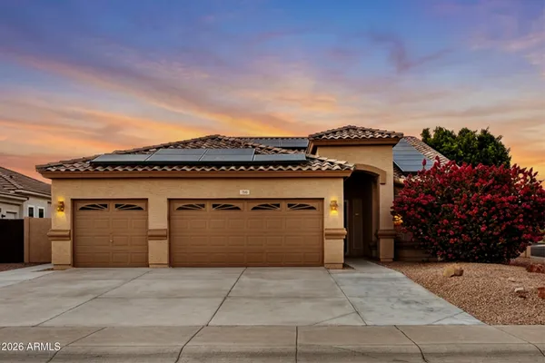 a front view of a house with a garage