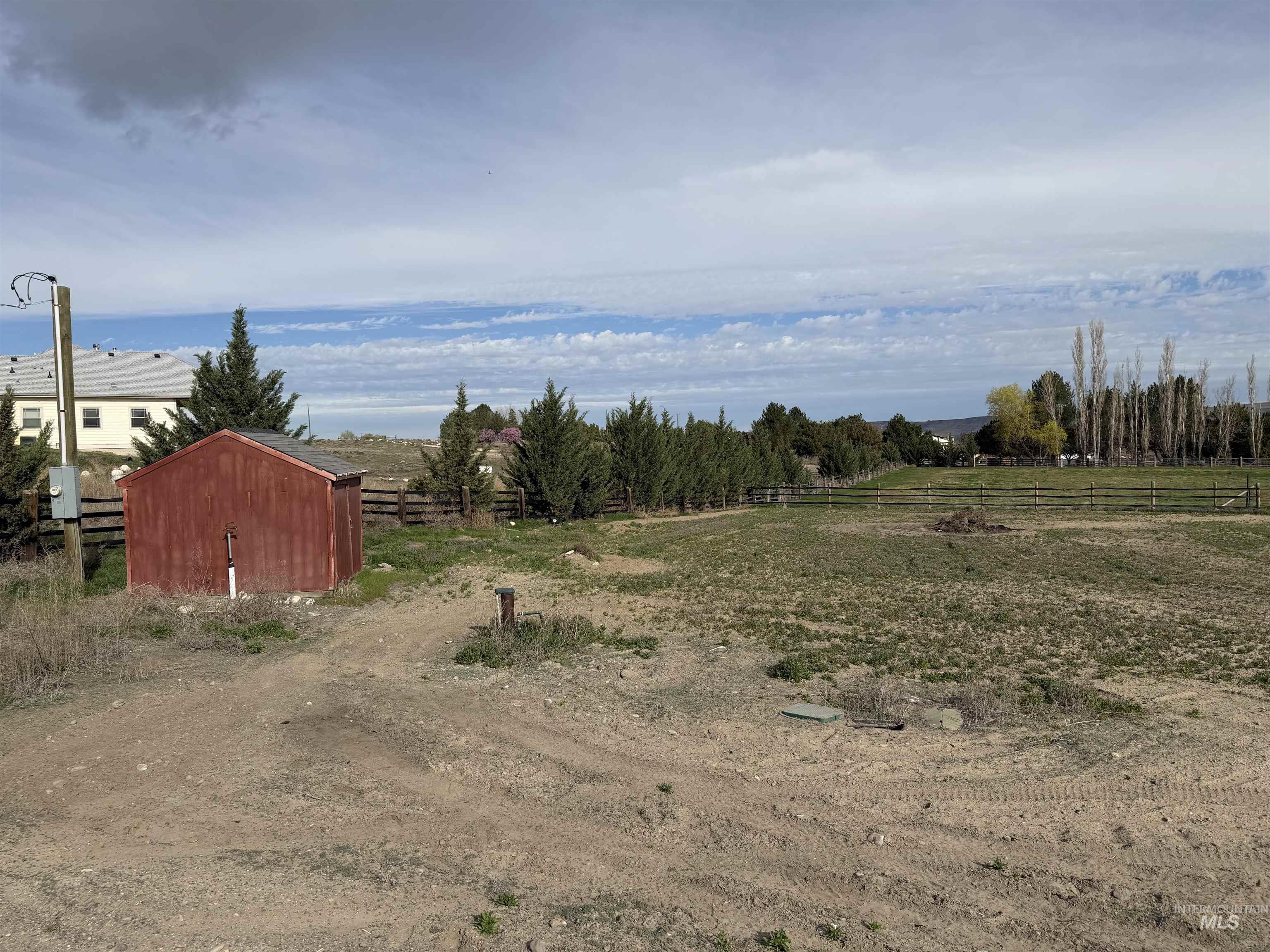 Tbd Good Day Road Melba, ID 83641 - Photo 5 of 8 View of yard featuring a view of countryside and a storage unit