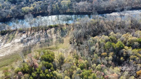 a view of lake with green space