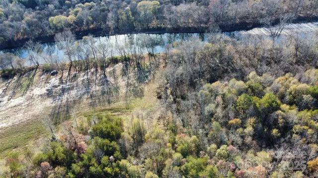 a view of lake with green space