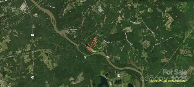 a view of a pathway with a yard