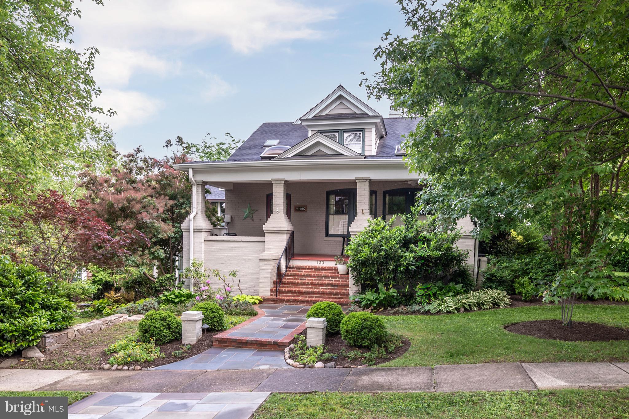 120 West Maple Street Alexandria, VA 22301 - Photo 3 of 100 a front view of a house with a garden