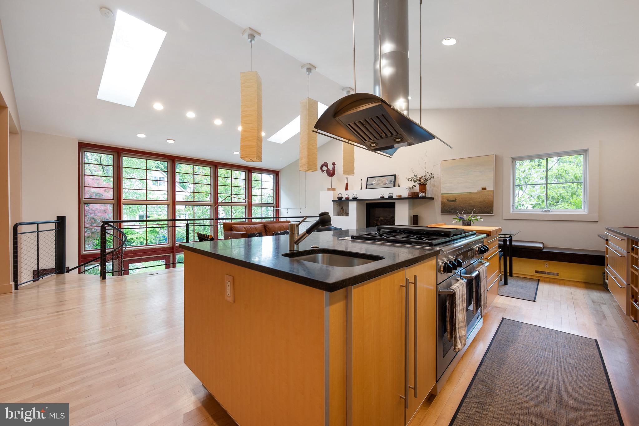 120 West Maple Street Alexandria, VA 22301 - Photo 36 of 100 a kitchen with stainless steel appliances granite countertop a stove and a large window