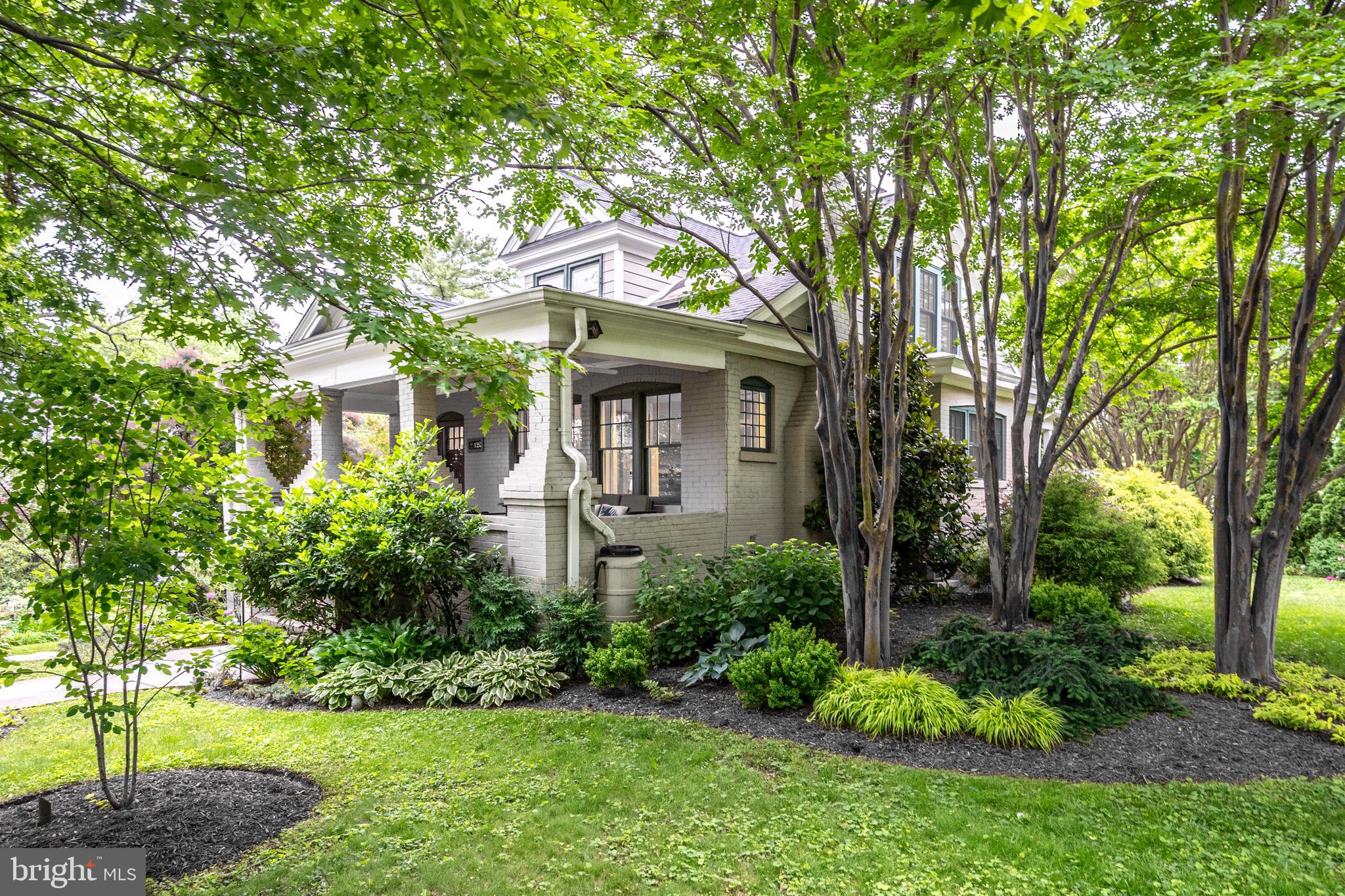 120 West Maple Street Alexandria, VA 22301 - Photo 4 of 100 a front view of a house with garden