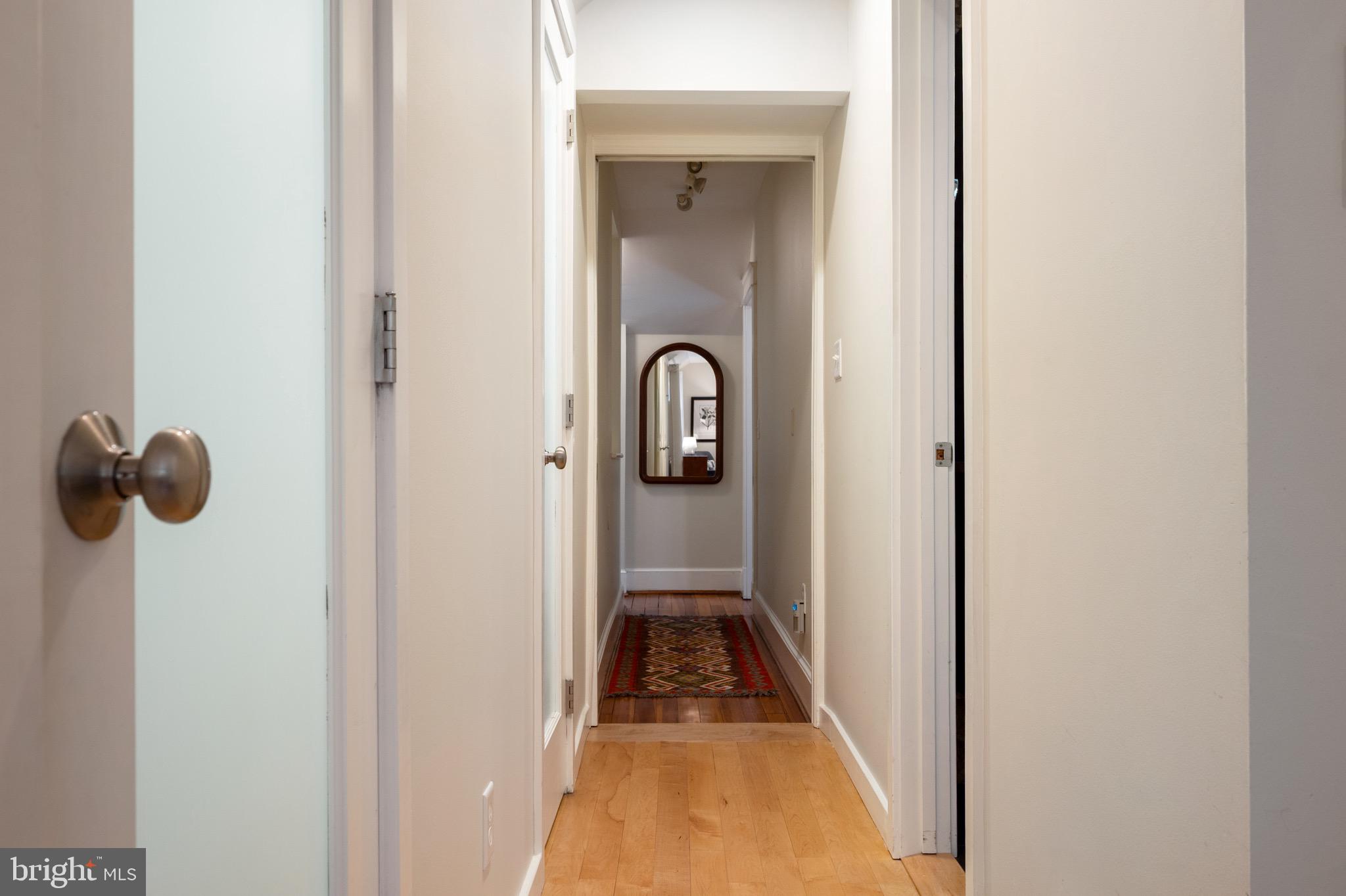120 West Maple Street Alexandria, VA 22301 - Photo 55 of 100 a view of a hallway with wooden floor