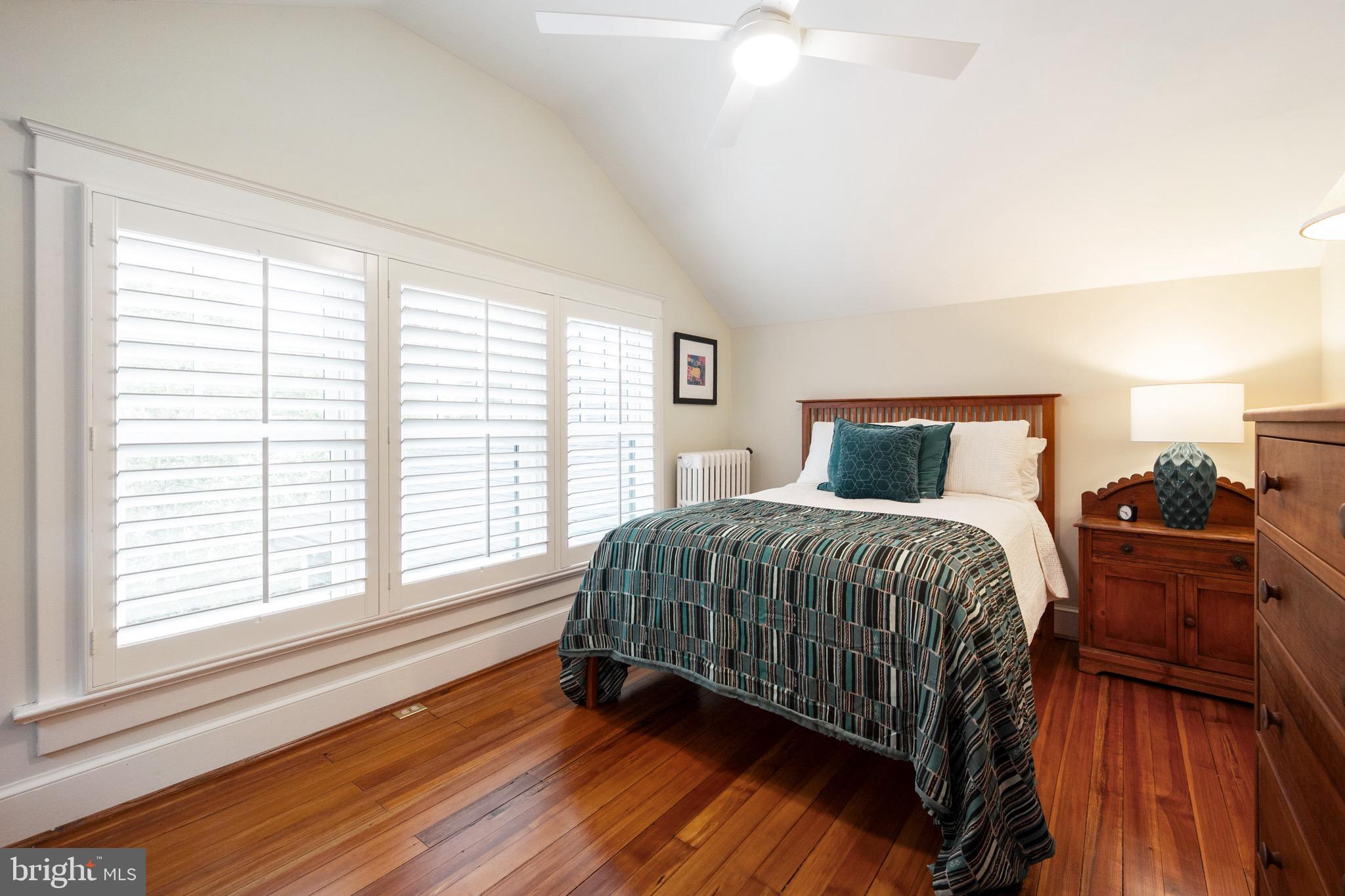 120 West Maple Street Alexandria, VA 22301 - Photo 58 of 100 a bedroom with a bed and wooden floor