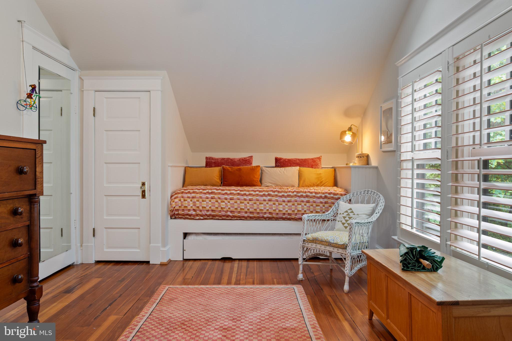 120 West Maple Street Alexandria, VA 22301 - Photo 60 of 100 a bedroom with a bed and wooden floor