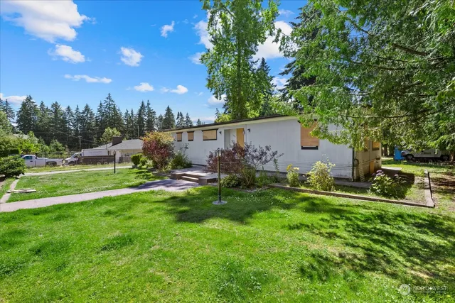 a garden view with a seating space
