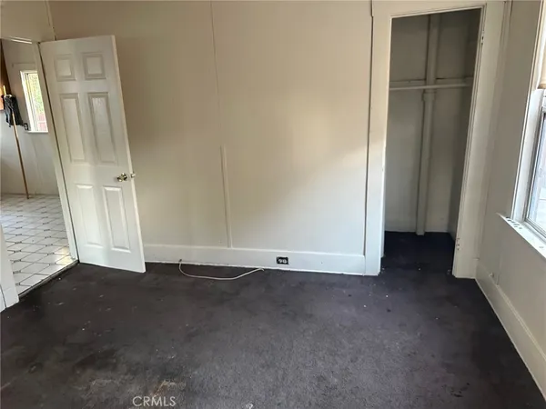 an empty room with a door