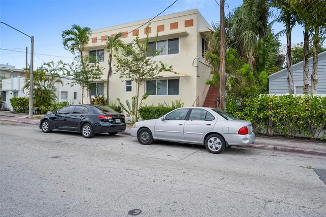 a cars parked in front of a house