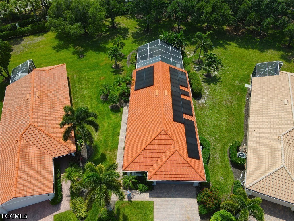 19694 Villa Rosa Loop Estero, FL 33967 - Photo 2 of 28 an aerial view of a house with garden space and street view