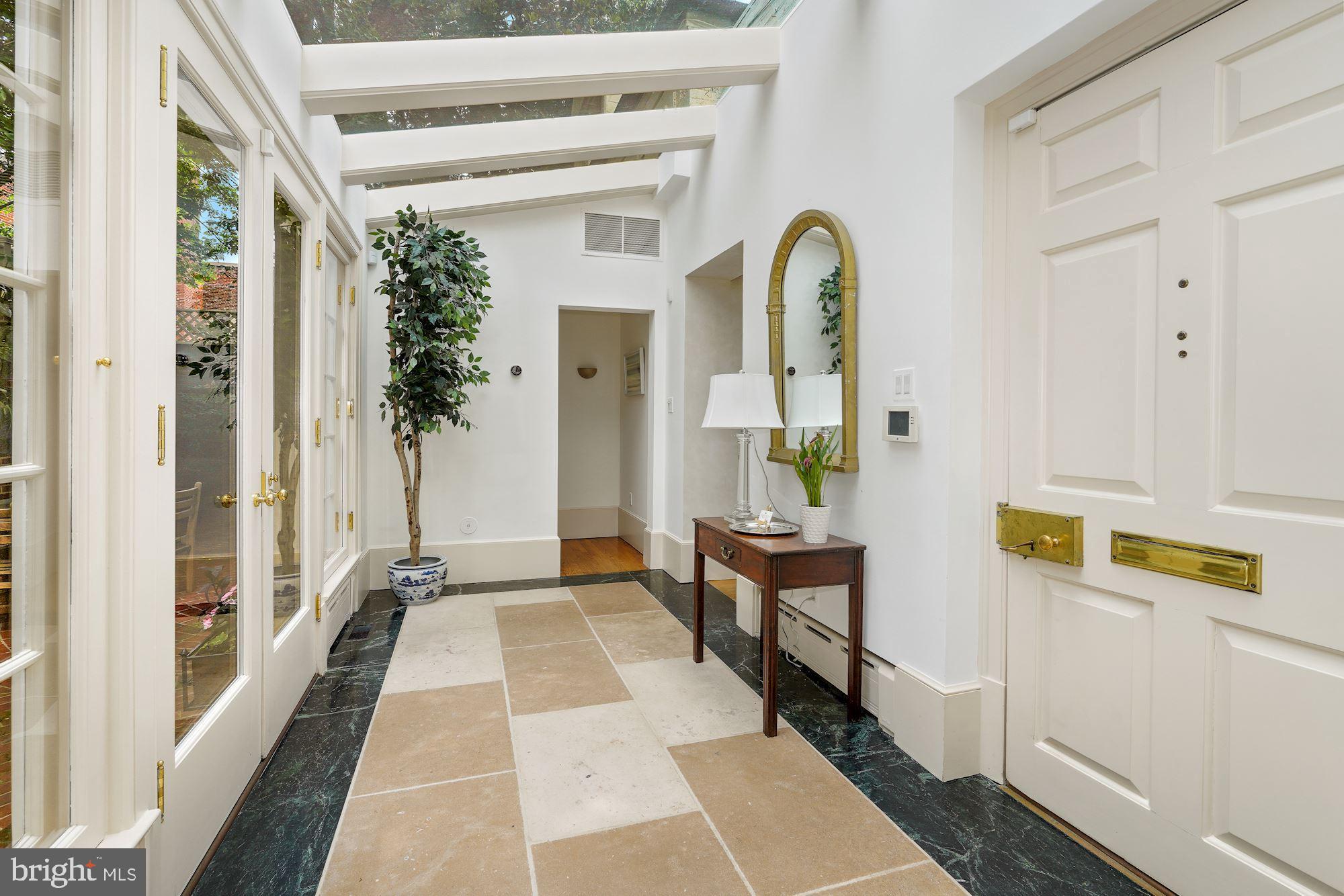 2750 Q Street Northwest Washington, DC 20007 - Photo 12 of 41 Back through skylit entry