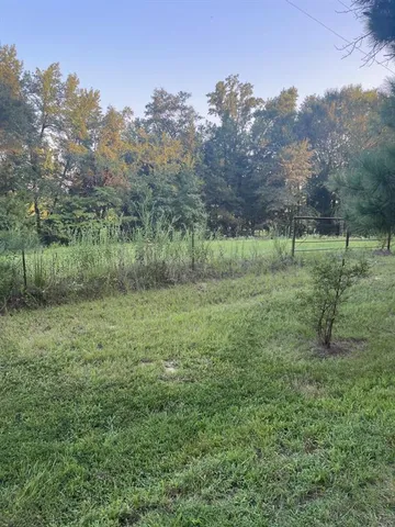 a view of outdoor space and green field