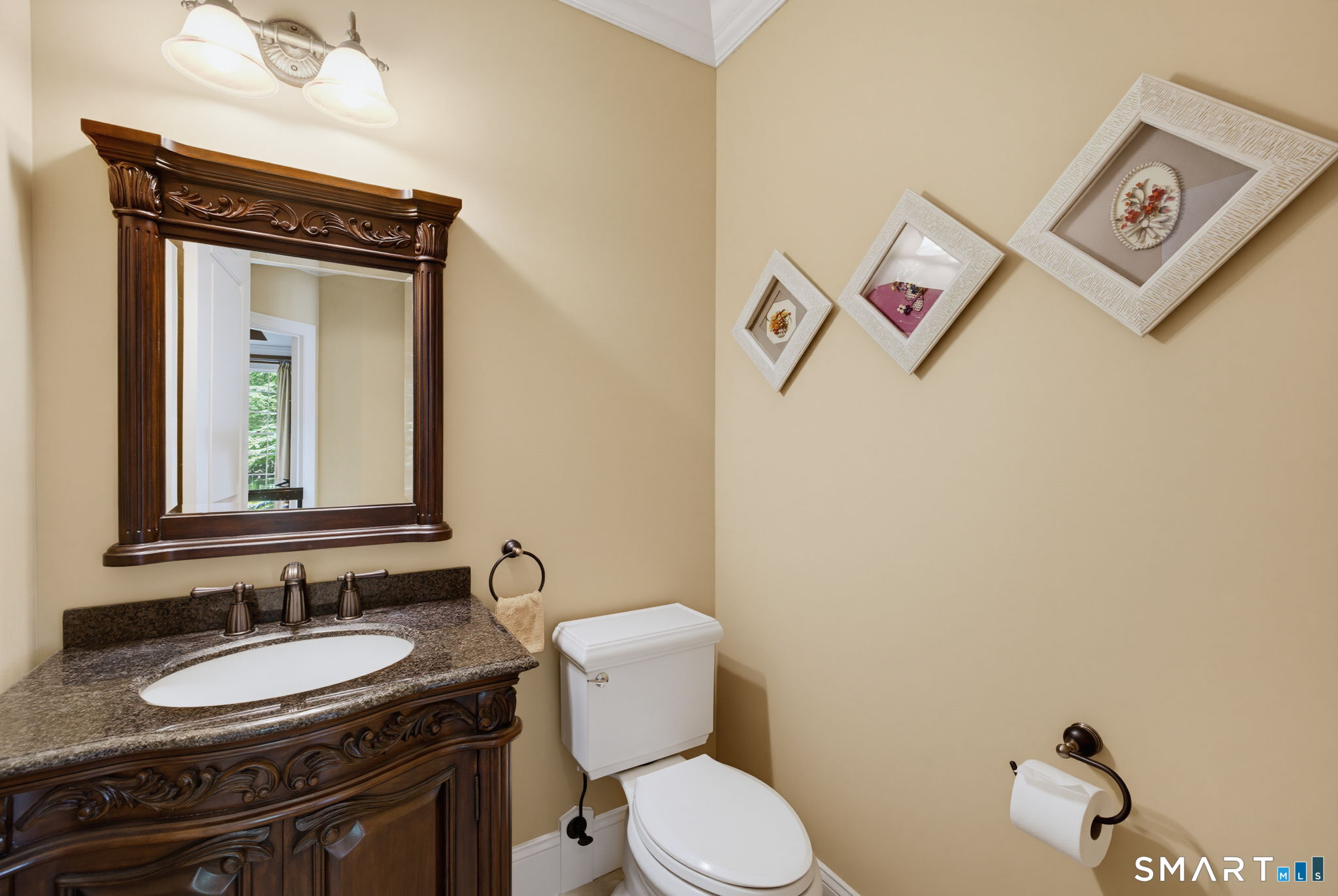 158 Appian Way Coventry, CT 06238 - Photo 30 of 40 a bathroom with a toilet a sink and mirror