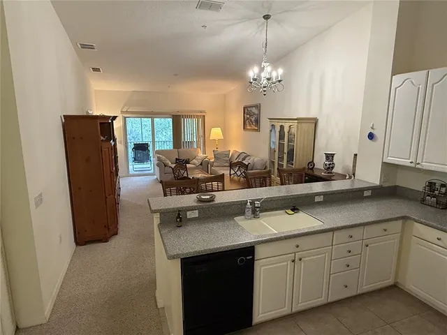 a spacious bathroom with a double vanity sink double and a mirror
