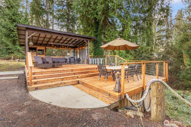 swimming pool view with a seating space
