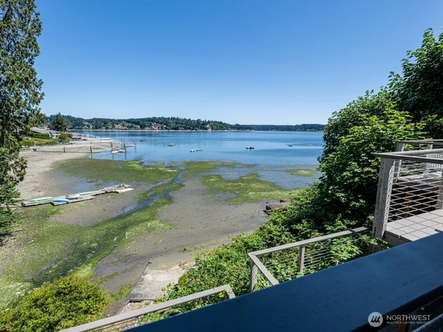 a view of a lake with a yard