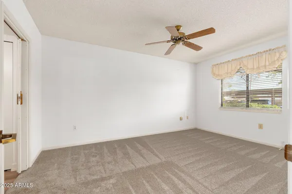 a bathroom with a sink a mirror and a shower