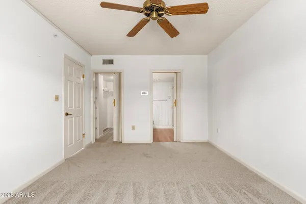a view of bathroom with a shower curtain and a sink