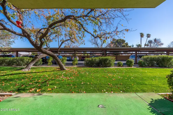 a outdoor space with lots of tables and chairs