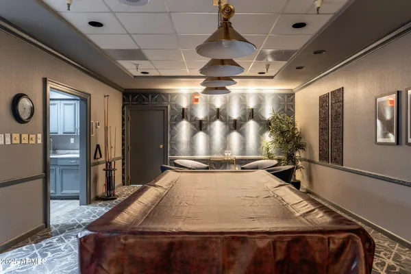 a front view of a house with garden and patio