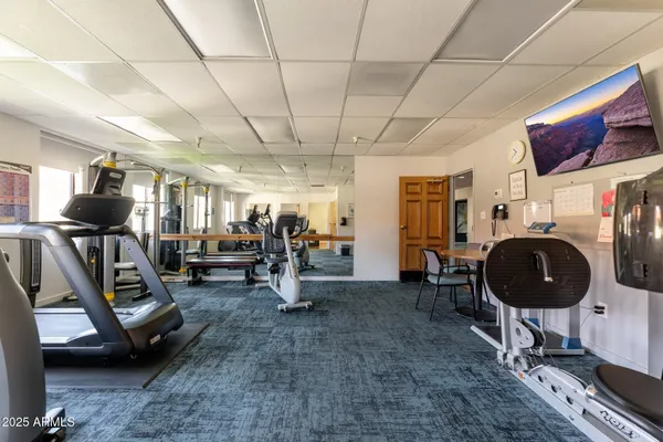 a view of swimming pool with outdoor seating