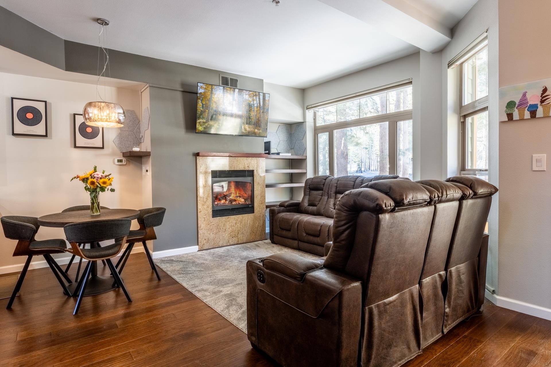 525 Manzanita Road, Unit 2 Mammoth Lakes, CA 93546 - Photo 2 of 28 a living room with furniture fireplace and a large window