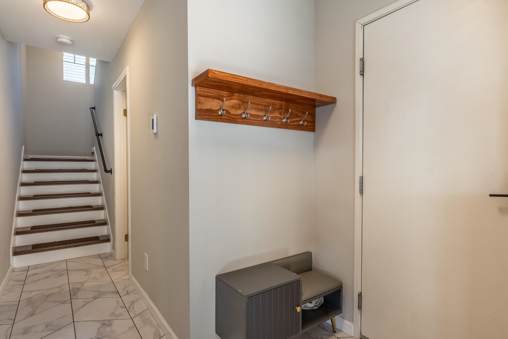 525 Manzanita Road, Unit 2 Mammoth Lakes, CA 93546 - Photo 21 of 28 Mudroom featuring light marble finish flooring and baseboards