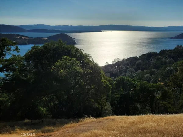 a view of a lake with a mountain in the background