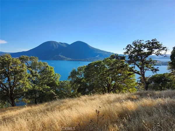 a view of a lake with a mountain in the background