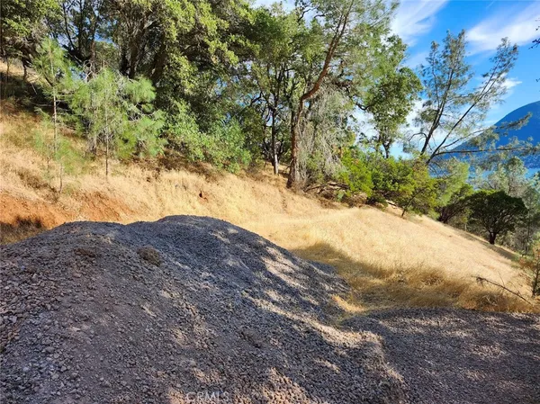 a view of mountain view with trees