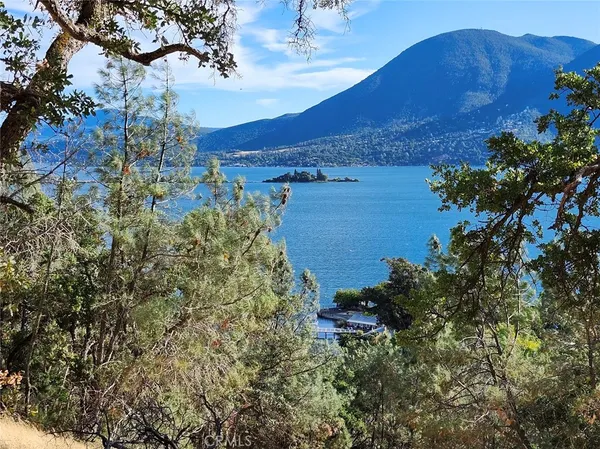 a view of a lake with mountains in the background