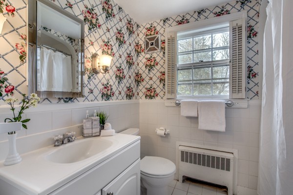 9 Orchard Road Hamilton, MA 01982 - Photo 16 of 22 a bathroom with a sink toilet and window