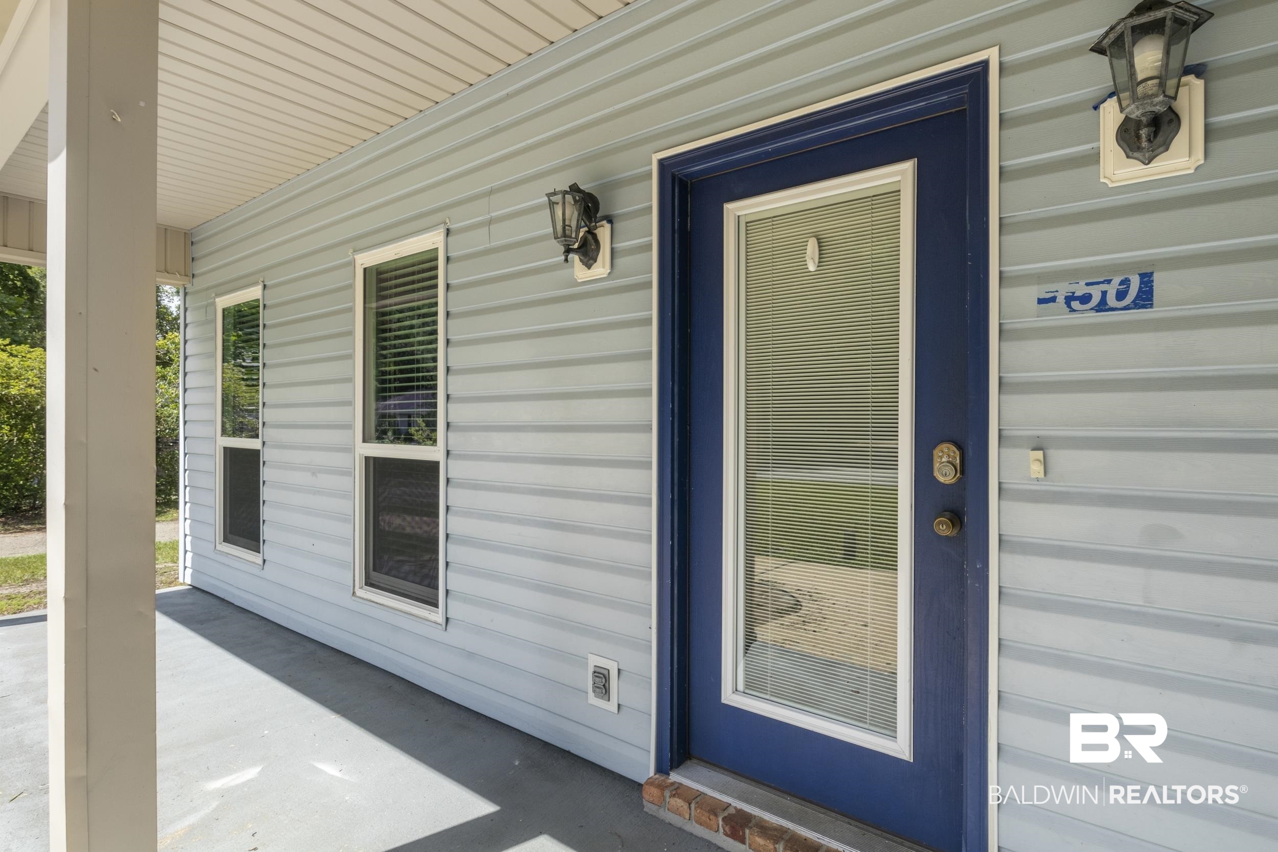 150 Montclair Loop Daphne, AL 36526 - Photo 6 of 29 Doorway to property with covered porch