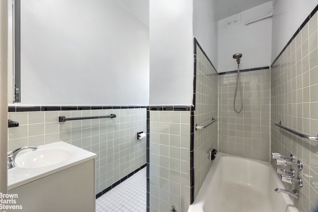 640 West End Avenue, Unit 12C Manhattan, NY 10024 - Photo 11 of 17 a bathroom with a sink and shower