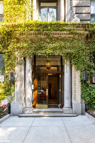 a view of a building with a tree
