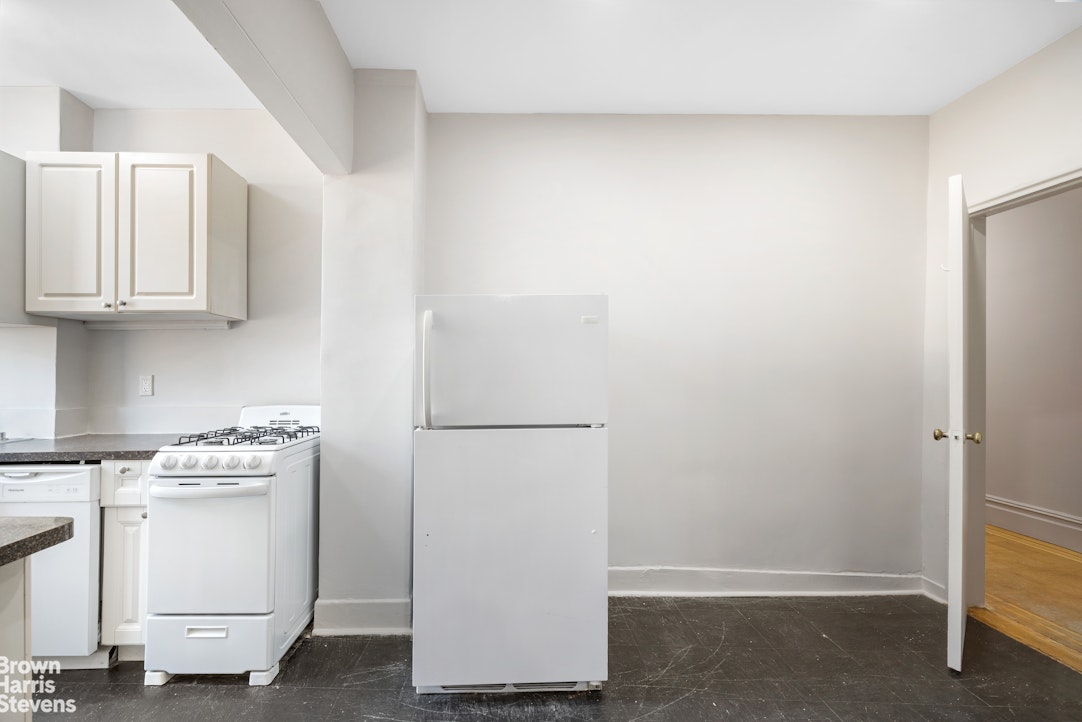 640 West End Avenue, Unit 12C Manhattan, NY 10024 - Photo 7 of 17 a view of cabinets and window