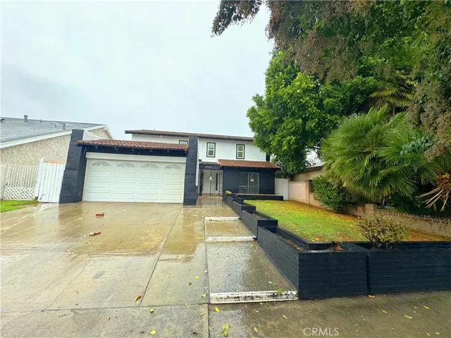 a view of a house with swimming pool