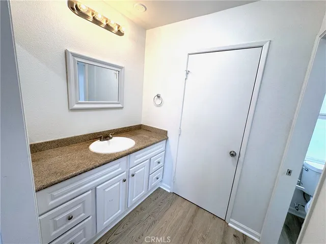 a bathroom with a toilet and a sink