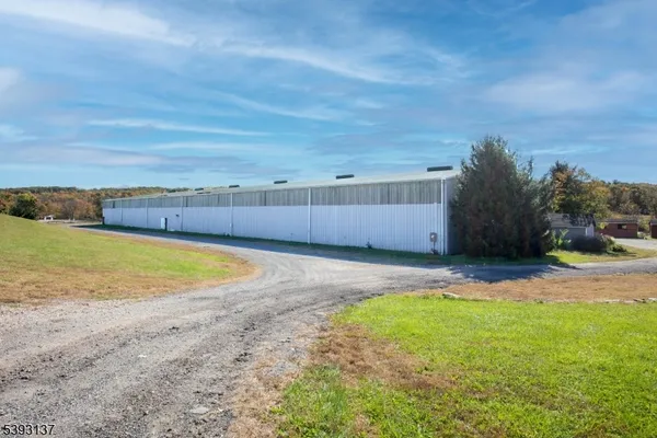a view of an empty room with a garage