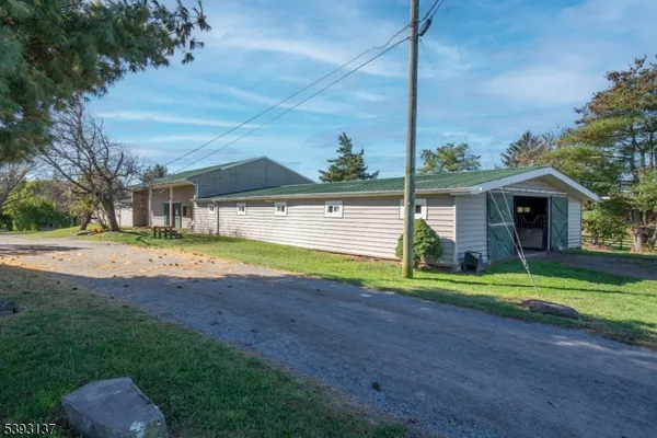 a view of a house with a big yard