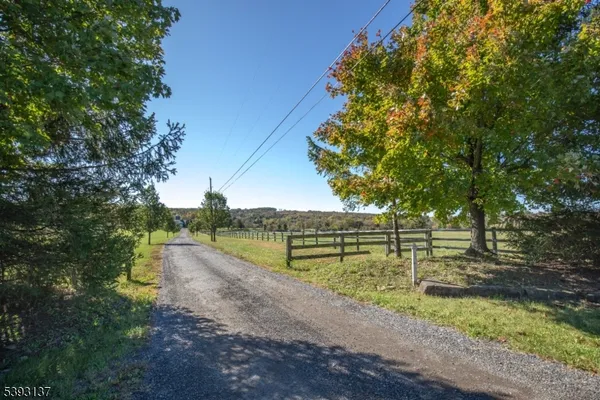 a view of lake with a yard