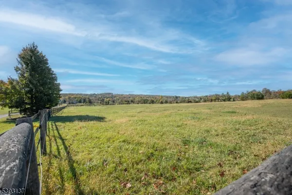 a view of a lake with a big yard
