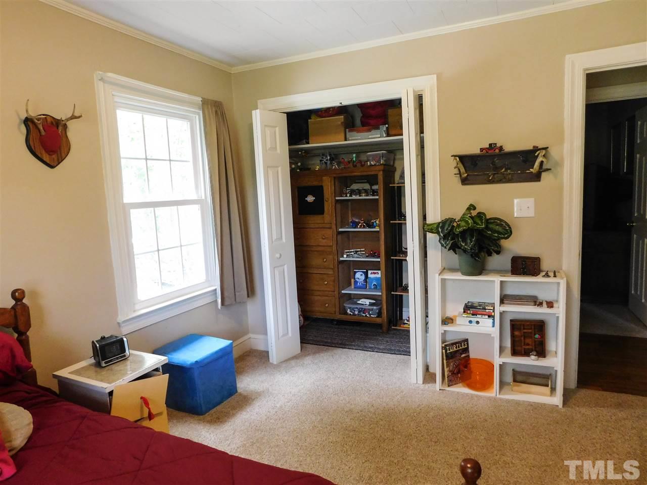 1096 Gillis Road Roxboro, NC 27574 - Photo 12 of 16 a view of livingroom with furniture and window