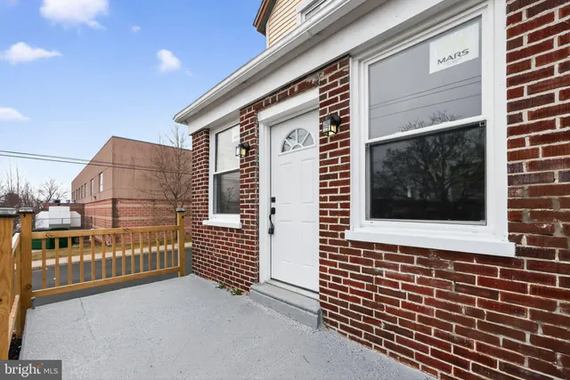 a view of a balcony with door