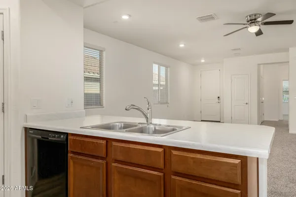 a bathroom with a shower and a sink