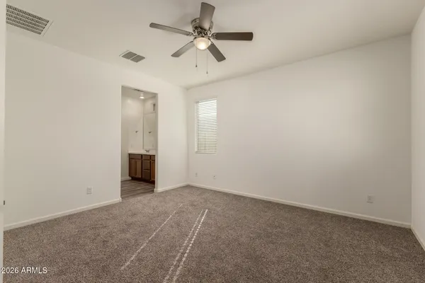 a view of a big room with carpet
