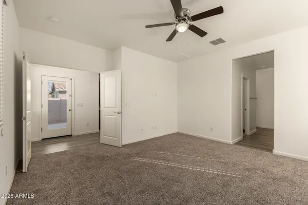a bathroom with a double vanity sink and mirror