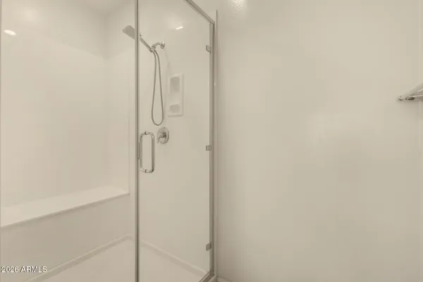 a view of an empty walk in closet